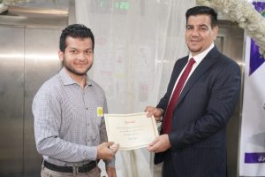 Dean of College of Islamic Sciences and His Assistants Honor the Winners of (Bismill Quranic Competition)